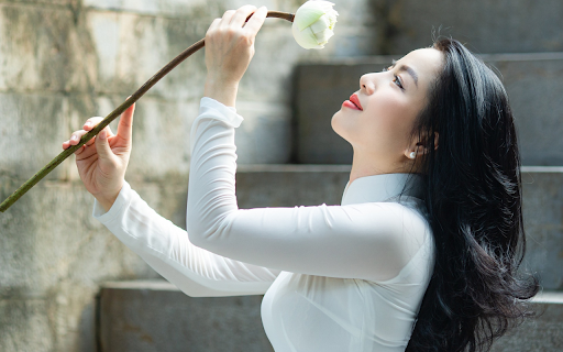 Girl holding a flower from Chrome web store to be run with OffiDocs Chromium online Girl holding a flower from Chrome web store to be run with OffiDocs Chromium online