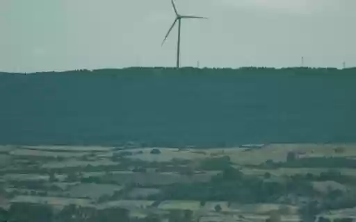A Wind Turbine near a Rural Area from Chrome web store to be run with OffiDocs Chromium online A Wind Turbine near a Rural Area from Chrome web store to be run with OffiDocs Chromium online